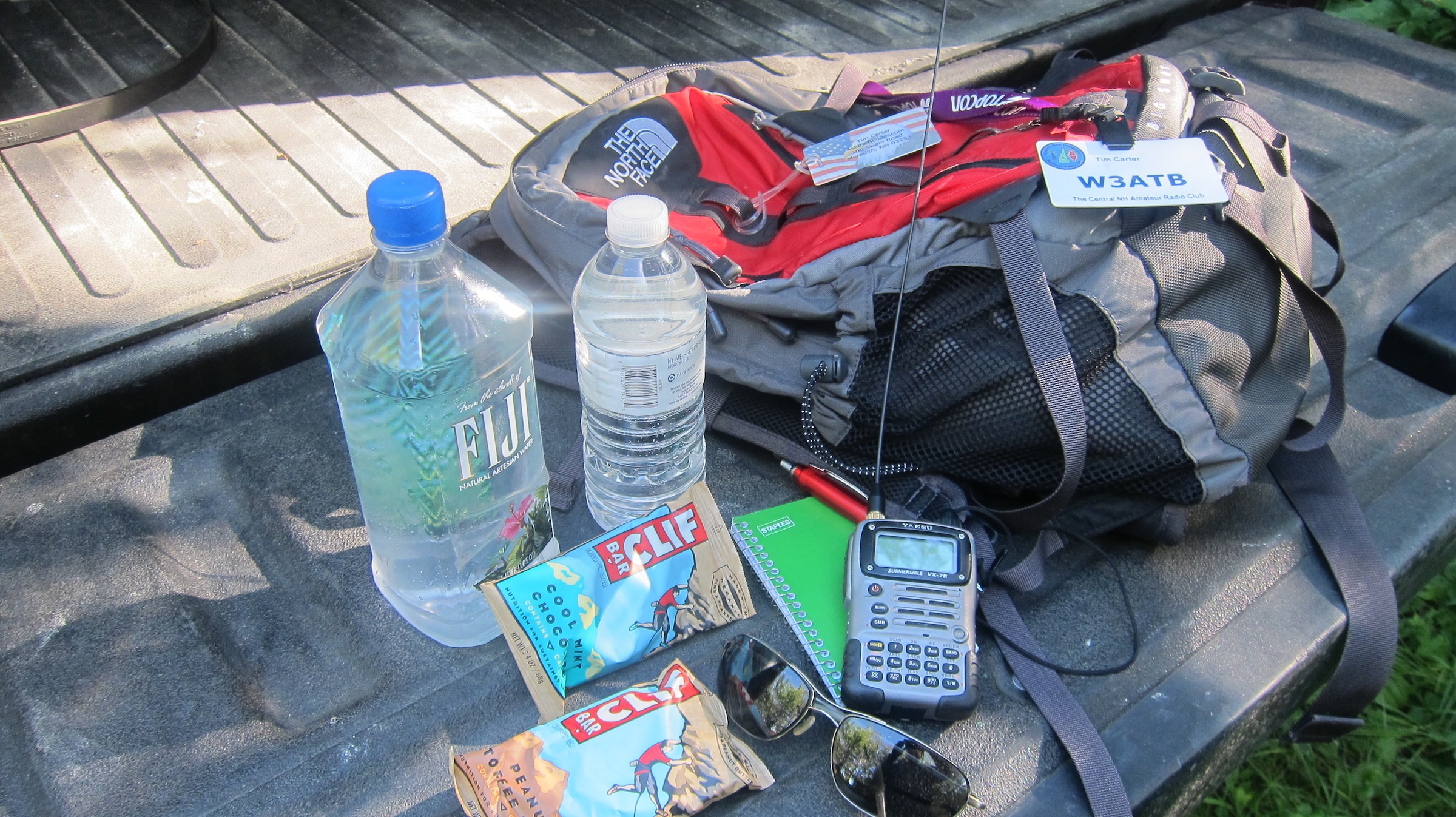 Here's the gear I carried to the summit. Much needed water, nutrition, radio, notebook and pen and sunglasses. More clothes were in the backpack.