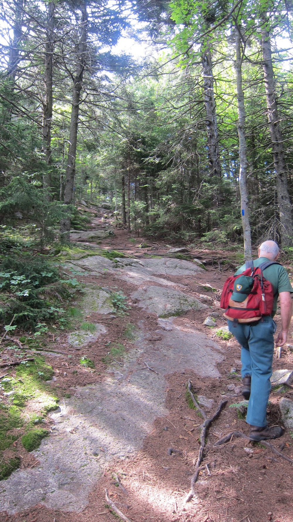 Hal Graham leading the way up the Blue Trail to the summit of Belknap Mountain. Note the exposed bedrock.