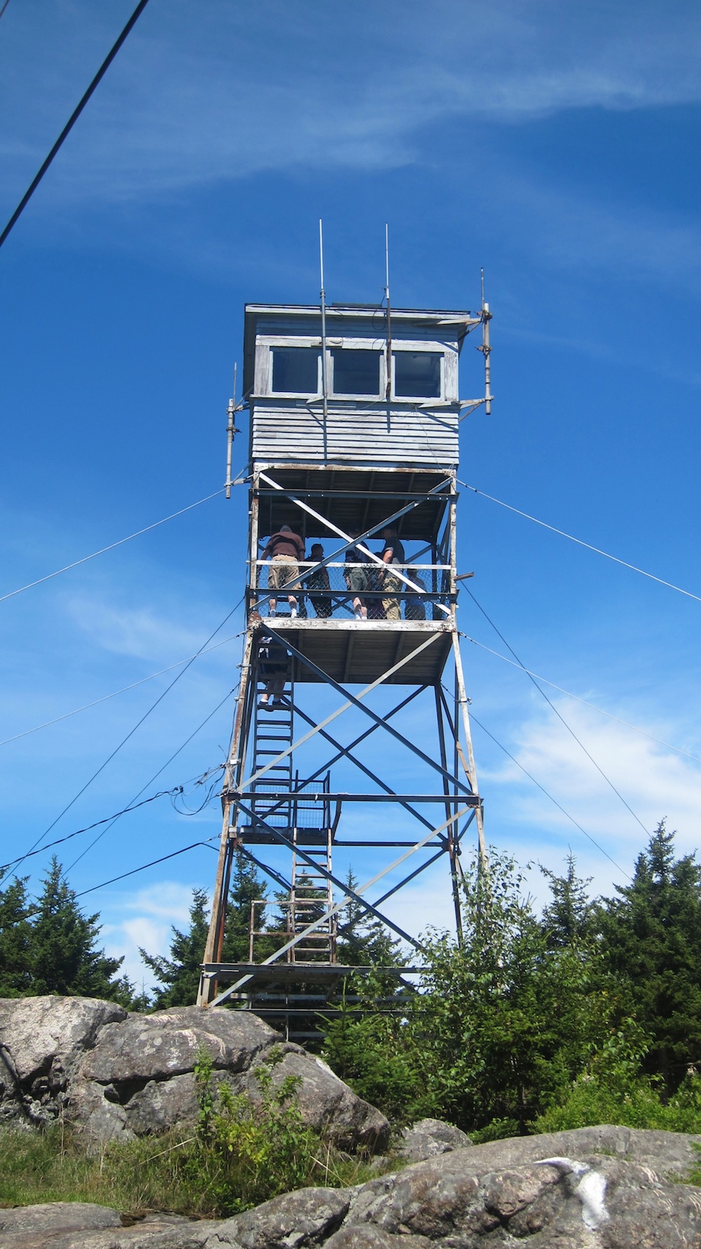 Here's the Belknap fire tower. You can see people that crowded the platform where I did my SOTA activation. They came up after I was finished.