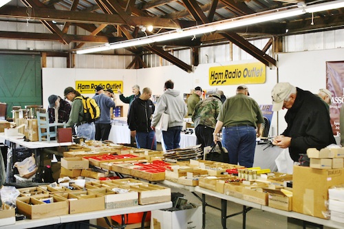 This is the typical scene inside the covered buildings at NEARfest. The secret Yaesu booth was just to the right. Photo credit: Glen Aldrich, KC1AAI