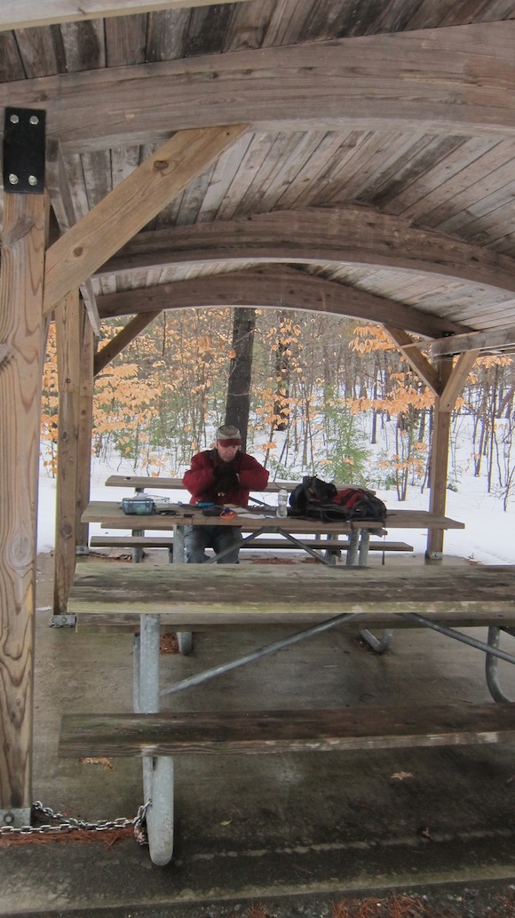 Here's Jim inside the shelter. The only thing missing was a nice fireplace! Photo credit: Tim Carter - W3ATB