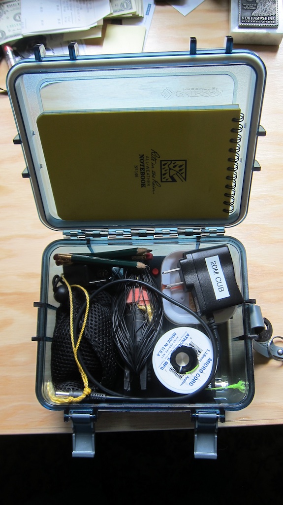Everything is in this box. The HB-1B is buried down under everything else. The only thing I need to operate is a rock to help get the green microcord halyard up into a tree. I partially filled water bottle is my weapon of choice.