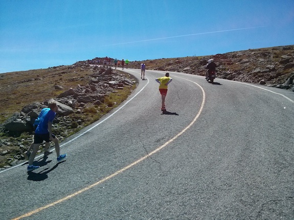 Here's a group of runners clawing their way to the top. The photo really doesn't show well the steepness of the inside part of the hairpin turn. Photo credit: Tim Carter