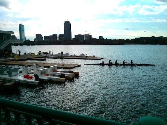 You can see a few of the odd open pontoon boats docked here at the MIT boathouse. A crew is pulling into the dock from an early practice on the water. Photo credit: Tim Carter - W3ATB