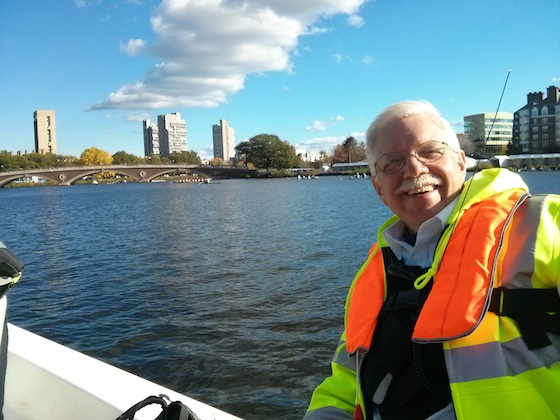 Here I am with wind-swept hair. The Weeks Bridge is in the background. It's just down river from the historic Harvard Boathouse. Photo credit: Patrick the BC student First Aid crew member