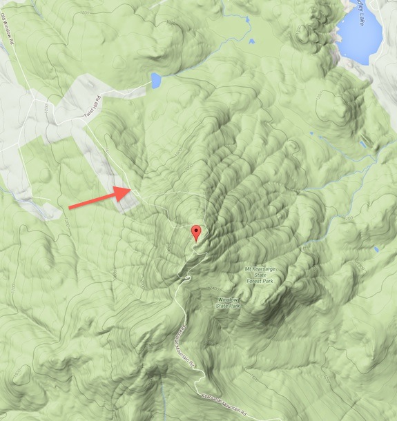 The tip of the red arrow points to a rare flat spot on the flank of Mt. Kearsarge. The view to the west, north and east is dramatic. Image credit: Google Maps